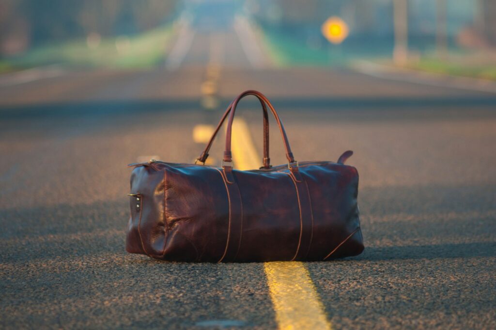 A duffel bag in the road