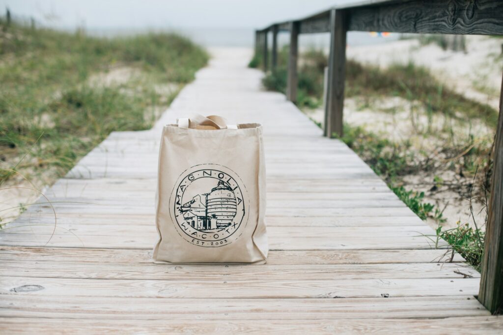 A tote bag on a boardwalk