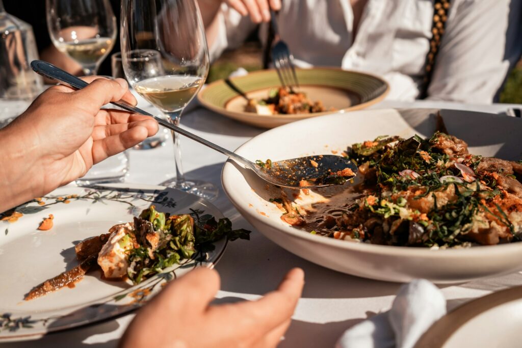 People sharing food al fresco