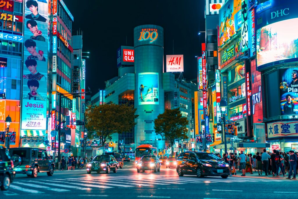 Shibuya Crossing lit up at night