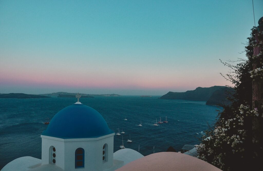 Sunset over a wedding Chapel in Santorini