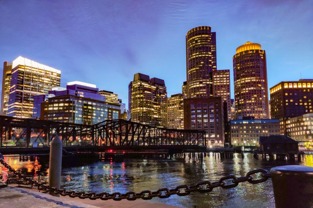 Boston Harbor lit up at night