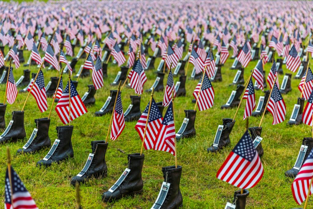 A row of flags lined up for Memorial Day