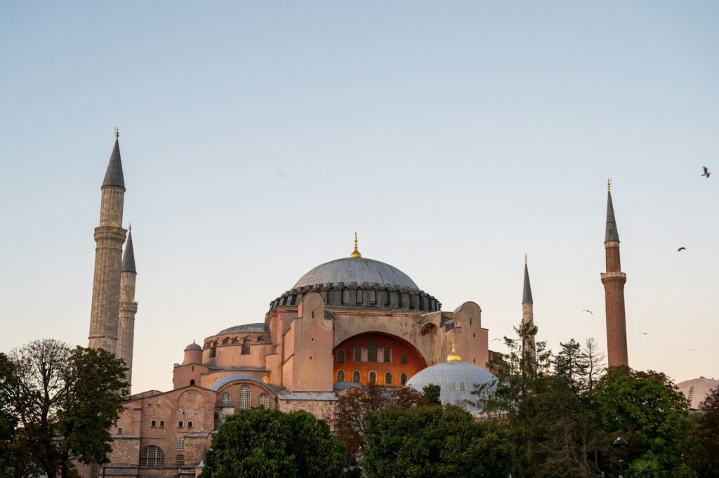 Hagia Sofia standing against a sunset backdrop.